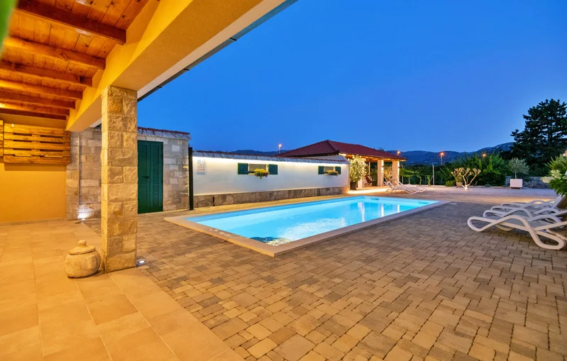 Villa Žarka exterior at dusk